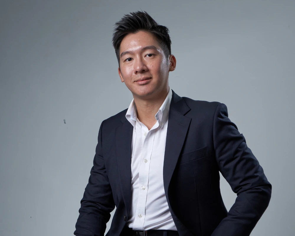 Patrick Loke, founder and elite trainer at ARMSTEL, with a background in tactical security and executive leadership